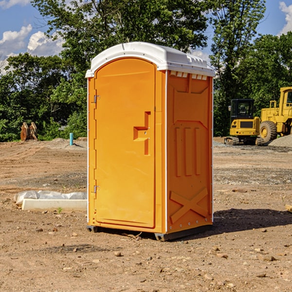 how often are the portable restrooms cleaned and serviced during a rental period in Wolf River